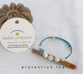 Bracelet artisanal spiral POE 1 avec pierre volcanique turquoise